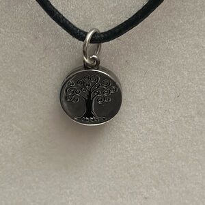 Double sided pendant on black string adjustable length